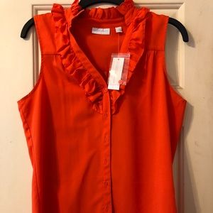 Orange ruffled blouse